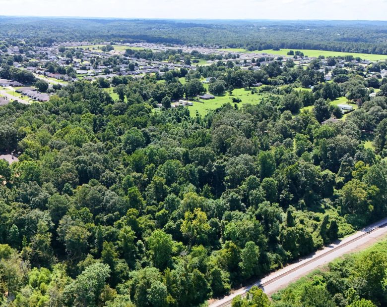 4.40 Wooded Acres Set in Tuscaloosa, Alabama with Creek, Utilities, & Safe Family Cul-de-Sac Living in Tuscaloosa County, AL